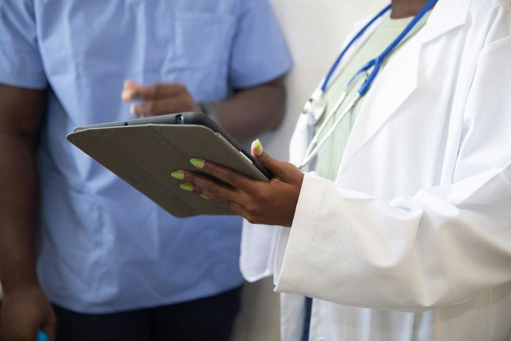 Clinician checking an order on a tablet